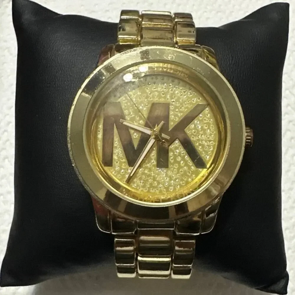 Michael Kors-3113 Woman’s Gold Tone Watch w/new Battery 100 Meters tested works - Picture 11 of 12